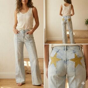 Free People Light Wash Wide-Leg Jeans with Yellow Star Appliqués